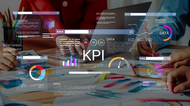 Colorful workspace with hands analyzing data and charts while reviewing key performance indicators through digital interface and graphics on the table Gluon.