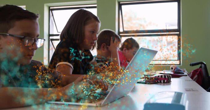 Kids typing at desk, leftmost tapping sweeping teal gold dust across laptops and hands for learning