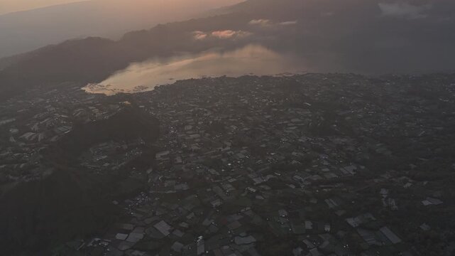 Golden sunrise over lake batur and mount agung in bali