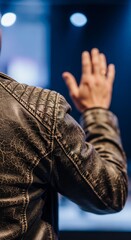 Naklejka premium Man wearing brown leather jacket waving.