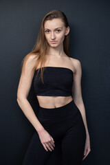 Fototapeta premium Professional model test shoot for agency submission. Natural beauty, minimal makeup, black wearing, clean background, confident poses. Perfect for portfolios, castings, and fashion