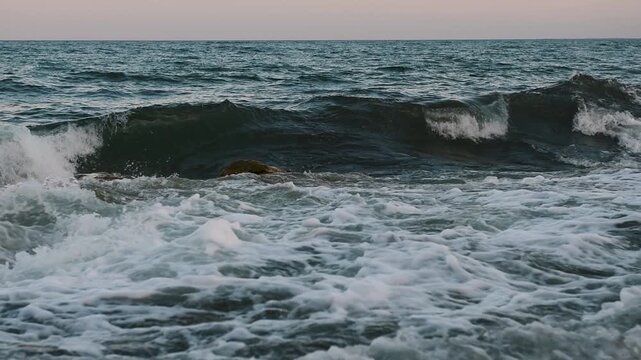 Slow motion waves breaking over rocks along the coast at Folhammar in Gotland, Sweden