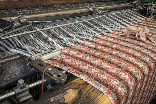 detail of a historic industrial loom machine