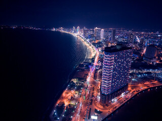 Fototapeta premium Aerial view night cityscape Nha Trang city and embankment of Sea Vietnam.