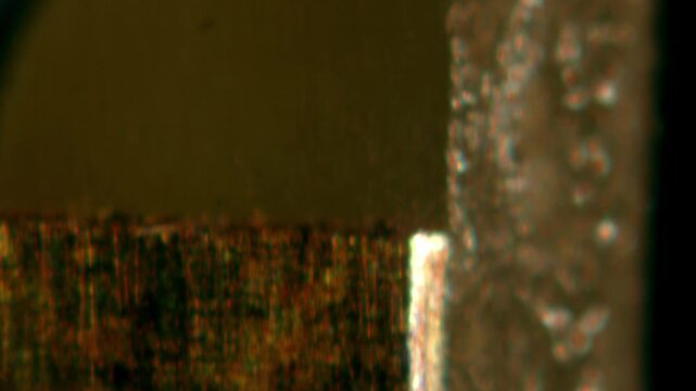 Macro Close-up Shot of Microchip, CPU Processor on Printed Circuit Board, Computer Motherboard with Components Inside of Electronic Device, Part of Supercomputer microscop.
