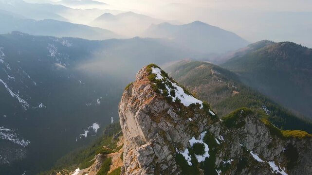 An aerial view of the snow-capped Rocky Mountains near Loveland Pass, Colorado, USA.