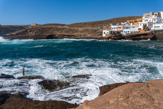 Rocky coast and ocean waves in La Jaca Tenerife