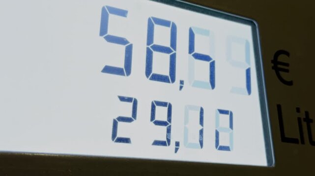 Fuel pump digital display. Modern digital fuel pump screen highlights cost and quantity data for consumer transparency
