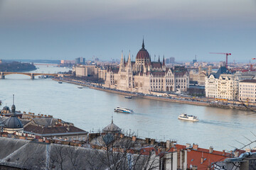 Obraz premium panorama view at the parliament with Danube river in Budapest