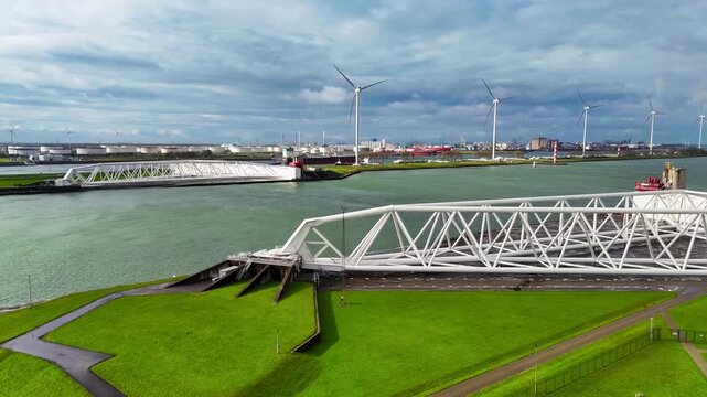 The Maeslantkering, or Maeslant barrier, is a storm barrier in the Rhine Delta in the Netherlands for flood protection. It is one of the largest moving structures on Earth. High quality 4k footage