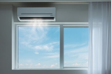 Fototapeta premium Airconditioner room window curtain vent white ductless unit cooling bright room with sheer curtain and blue sky outside