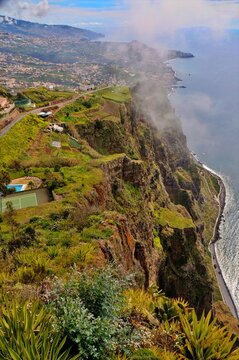 Dramatic View of Cabo Girao Cliffs in Madeira Portugal Representing Coastal Majesty and Natural Exploration