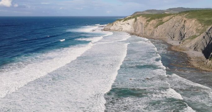 Aerial panoramic shot of Sopela cliffs and Atlantic ocean Bilbao