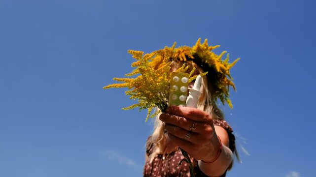 A woman is allergic to ragweed. Selective focus.