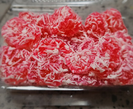 Cenil Traditional Indonesian Sweet Cake with Grated Coconut in Plastic Container