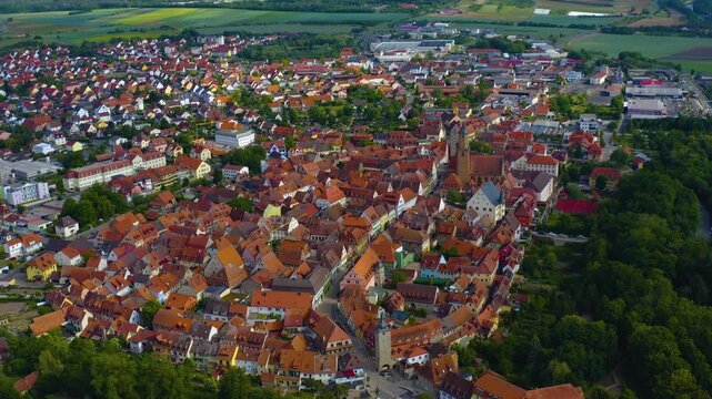 Panorama aerial view of the old town city Volkach in Germany  on a cloudy day in spring.