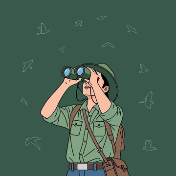 Adventurous Ornithologist Gazes Through Binoculars At Sky