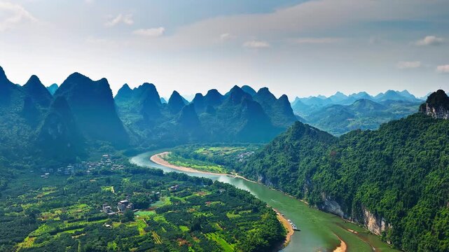 Scenic aerial view of the Li River winding through karst mountain peaks in Guilin, China.