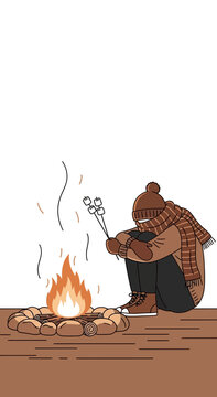 Cozy Winter Evening Enjoying S'mores Around a Crackling Campfire