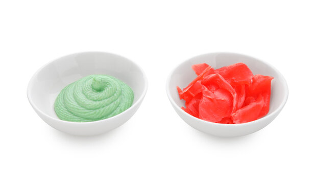 Bowls with wasabi and pickled ginger isolated on white background, closeup