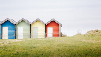 Obraz premium Blyth Beach Huts, on a overcast Spring day, Blyth, Northumberland, March 2026
