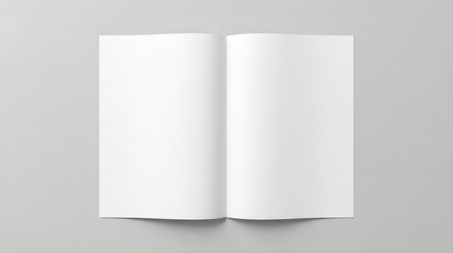 Top view of an open blank white booklet, brochure, or magazine mock-up template on a neutral grey background, ready for custom design and presentation
