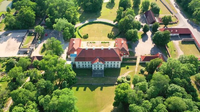 Aerial 4K video from a drone to Suuremoisa baroque manor ensemble in Estonia.  Hiiumaa, Estonia, baltic.