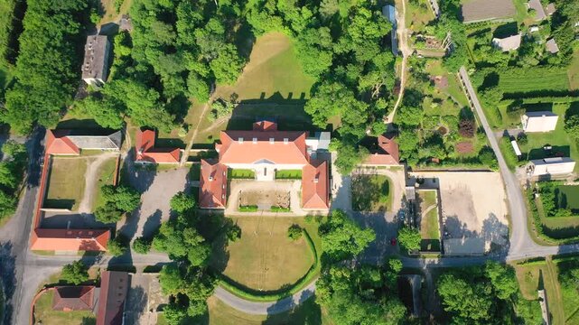 Aerial 4K video from a drone to Suuremoisa baroque manor ensemble in Estonia.  Hiiumaa, Estonia, baltic.