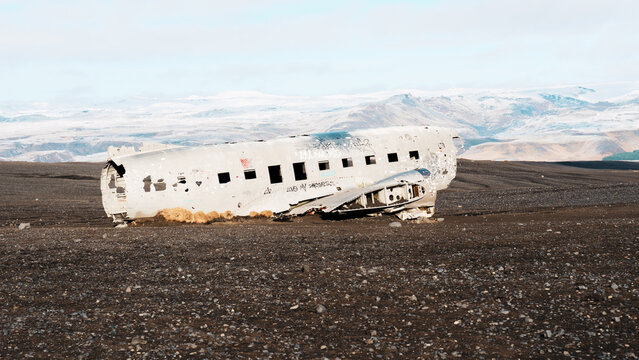 Abandoned DC-3 Plane Wreck with Snowy Mountains, Iceland