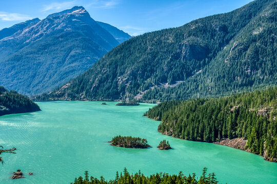 Turquoise lake nestled among towering mountains