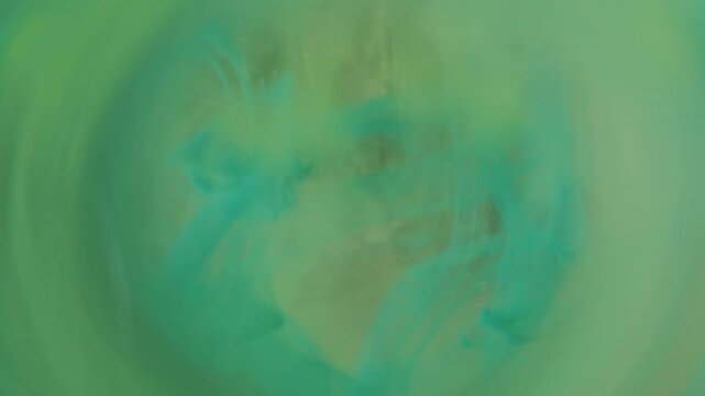 Blur mist blend. Paint vapor drop. Blue green pigment spilling in round prism tunnel background. Color abstract blob fog glow whirl.