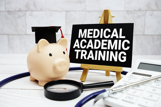 Medical Academic Training text with mortarboard, piggy bank, calculator, magnifying glass and stethoscope