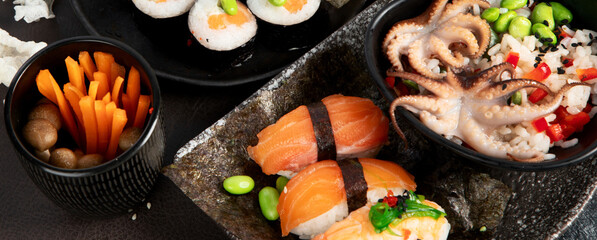 Various types of sushi including nigiri and rolls. Asian food concept. © bit24