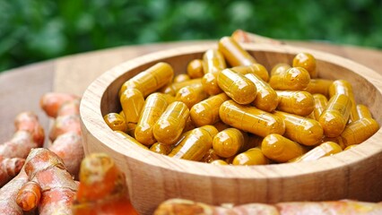 Turmeric curcumin capsules with rhizome (root).