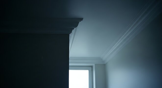 Close-up of Ceiling Crown Molding Decorative Trim in Modern House Interior