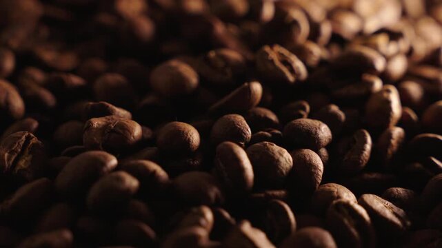 Extreme close up of a pile of coffee beans