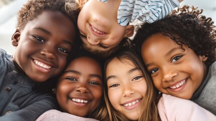 Fototapeta premium Diverse children smiling closeup male female african asian caucasian child friendship portrait joyful faces together innocence and warmth in group selfie