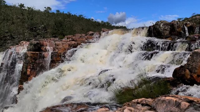 Waterfall at Cataratas dos Couros in Chapada dos Veadeiros National Park, Goi&aacute;s, Brazil, a protected UNESCO area known for quartzite geology and cerrado biodiversity.