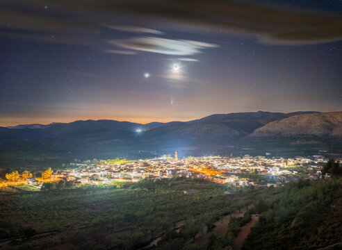 Celestial Conjunction of Moon Jupiter and Comet Above Alcublas Town