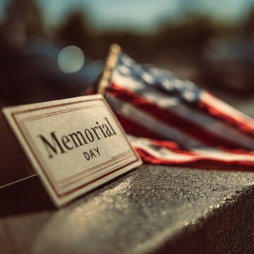 Patriotic tribute: bold Memorial Day lettering with a waving flag in a calm photograph