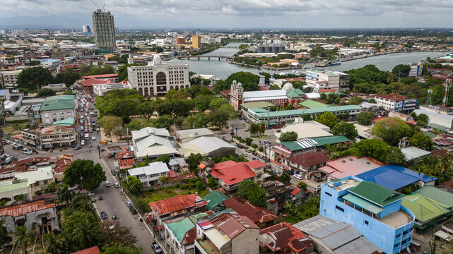 Aerial cityscape drone above Iloilo city Philippines urban landscape with river and skyline Panay Island 
