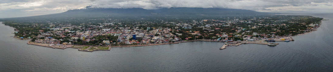Fototapeta premium ultra wide panoramic drone view Dumaguete, Philippines Aerial of Rizal Boulevard and City Skyline