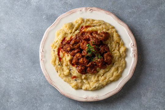 Turkish Food Hunkar Begendi made with Eggplant and Meat.