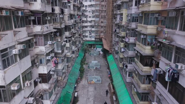 Aerial view of Hong Kong&rsquo;s famous Monster Building in Quarry Bay, showcasing its dense residential blocks and striking repetitive facade in the urban landscape (6)