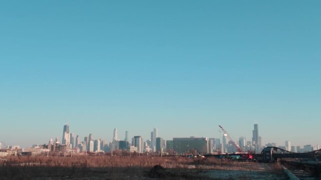A west side view of the City of Chicago and it's full skyline with the Hancock building and Sears Tower skyscrapers.