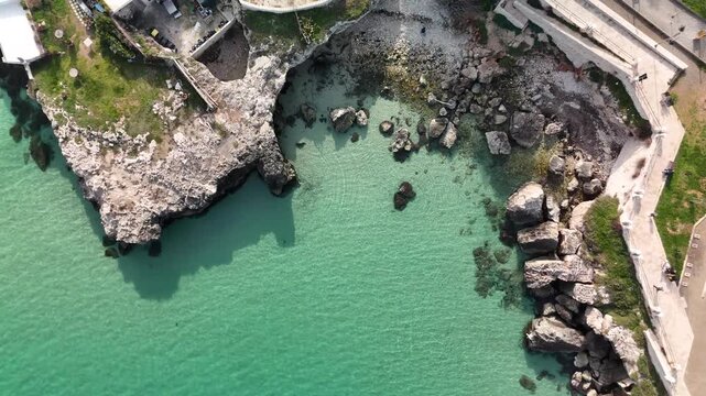 Aerial View of Rocky Coastline and Turquoise Sea at Calette di Torre Cintola on the Adriatic Coast near Monopoli, Bari, Puglia, Southern Italy
