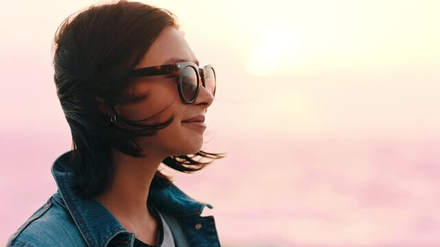 Woman, sunglasses and wind outdoor with summer holiday, hair tuck and thinking for weekend getaway. Space, female person and shades with reflection, remember memory and breeze for serene vacation.