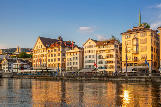 Historic buildings along Limmatquai Zurich at sunset in summer