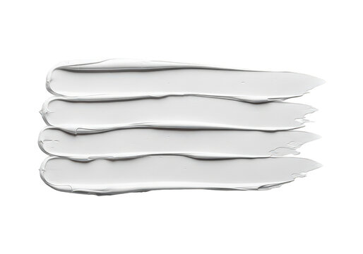 Four white paint smears on a pure transparent background for design and artistic use