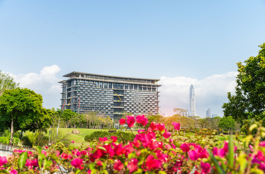 modern skyscrappers view from publick park in Shen Zhen with Building under construction of hotels and conference centers for APEC